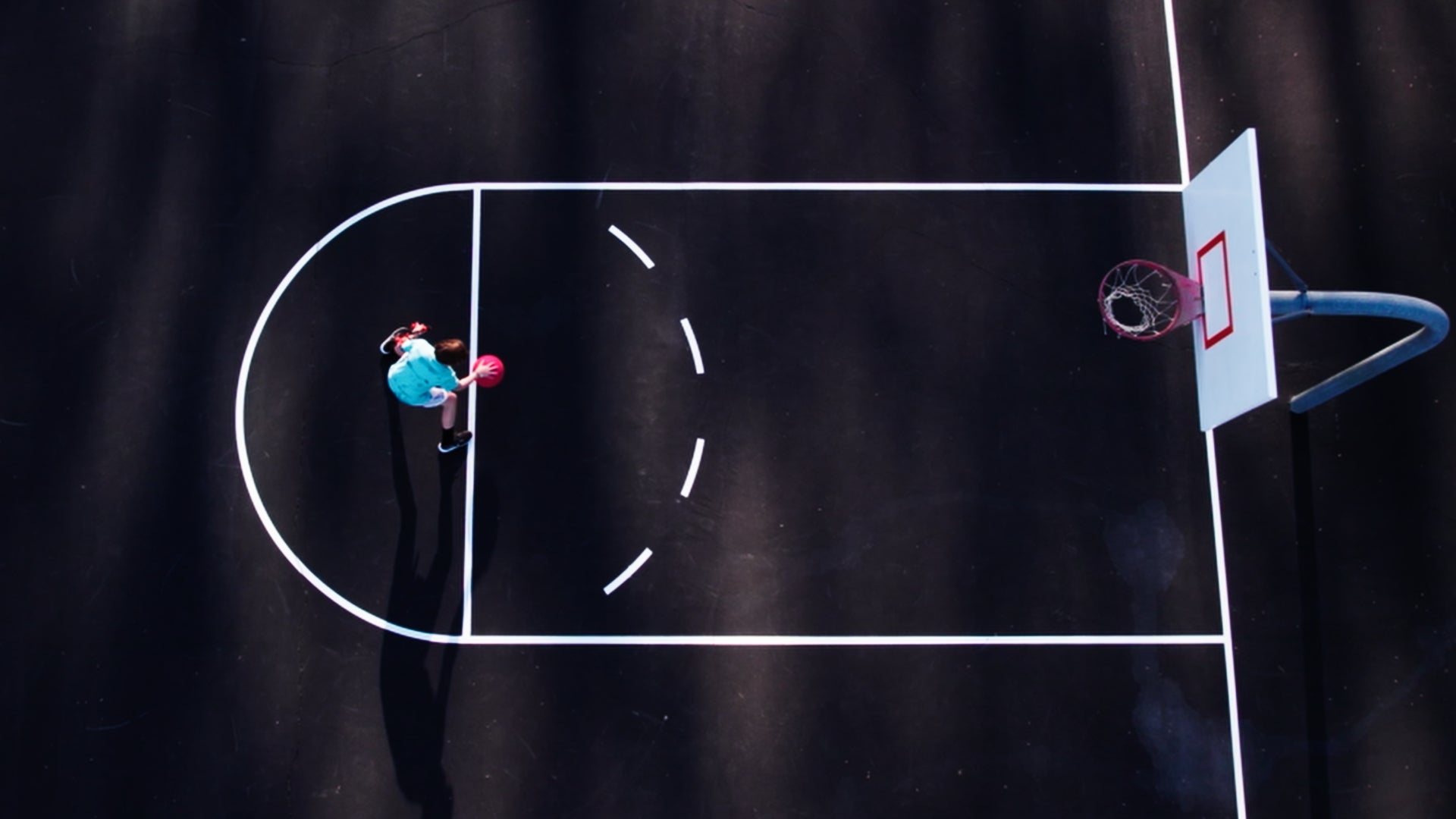Overhead look of young male player training with Perfec'Shot